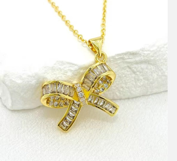Gold Plated Stainless Steel Bow Pendant with CZ stones Necklace
