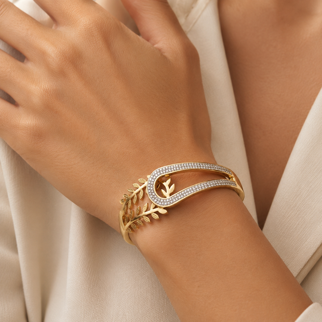Dual Design Gold-Tone Bangle Bracelet  With A Delicate Leaf Motif and White Stones