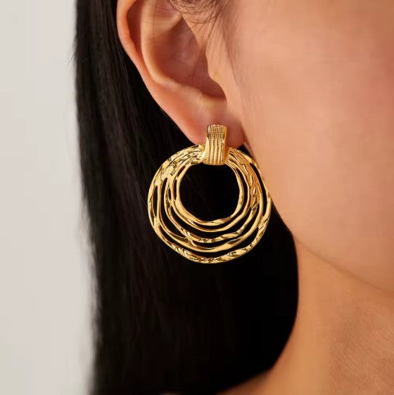 Multi-Ring Hoop Earrings With A Textured Finish.