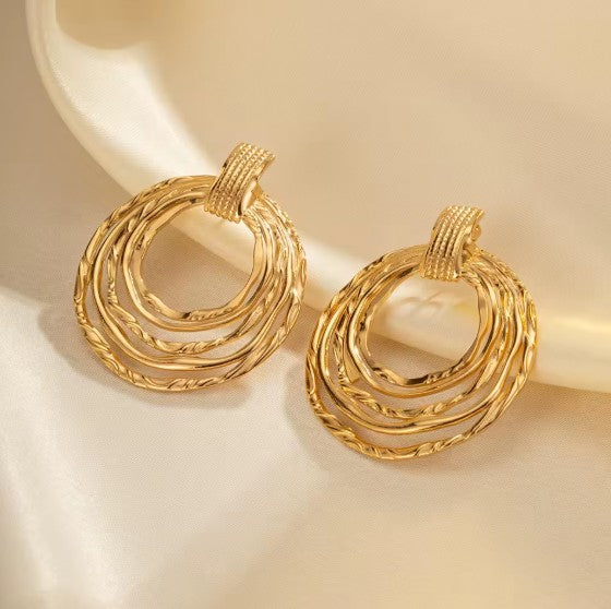 Multi-Ring Hoop Earrings With A Textured Finish.