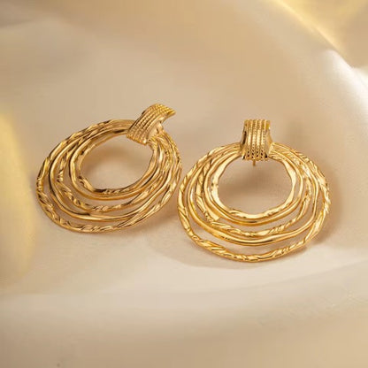 Multi-Ring Hoop Earrings With A Textured Finish.