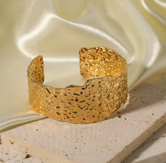 Gold plated Stainless Steel hammered metal cuff bracelet.