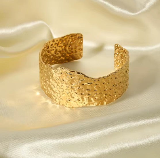 Gold plated Stainless Steel hammered metal cuff bracelet.