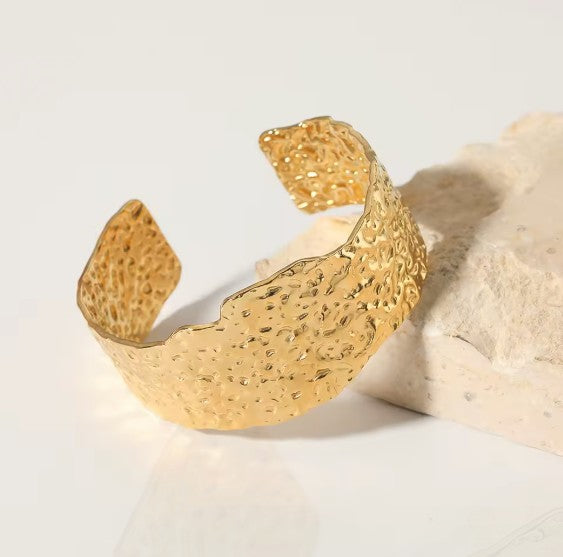Gold plated Stainless Steel hammered metal cuff bracelet.