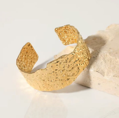 Gold plated Stainless Steel hammered metal cuff bracelet.
