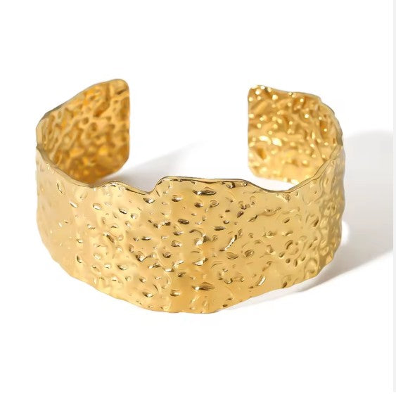 Gold plated Stainless Steel hammered metal cuff bracelet.