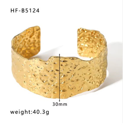 Gold plated Stainless Steel hammered metal cuff bracelet.