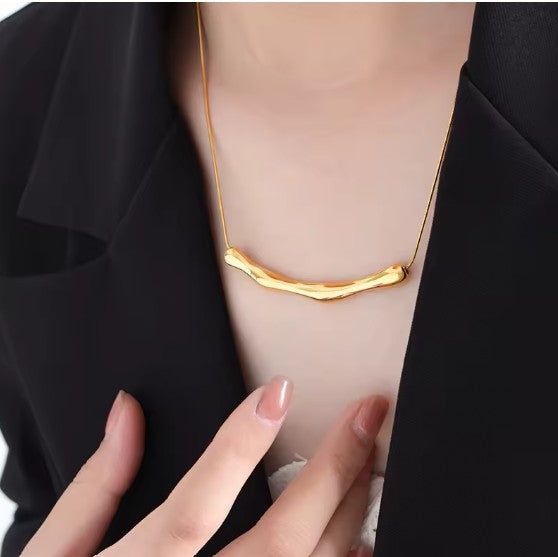 Gold Plated Stainless Steel Tranish-Free Arc Chain Necklace With Irregular Bar Pendant.