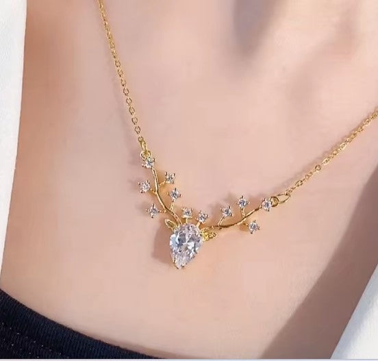 Deer Pendant Necklace With White  Zircons.