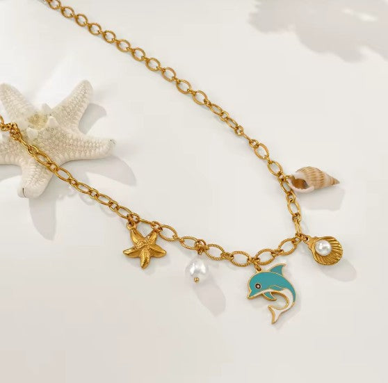 Sea-inspired Gold-tone Charm Necklace With Enamel Blue Dolphin, Starfish, Shell and Perl