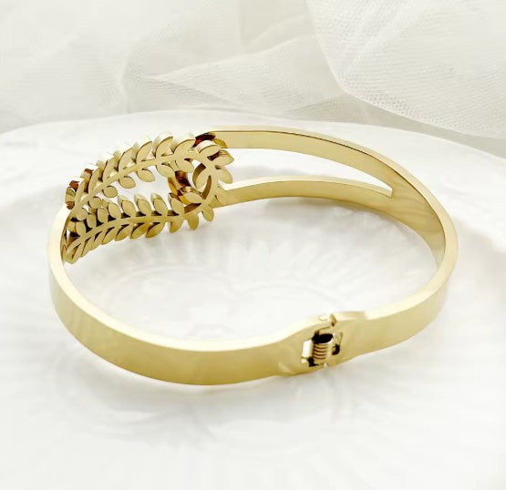 Dual Design Gold-Tone Bangle Bracelet  With A Delicate Leaf Motif and White Stones