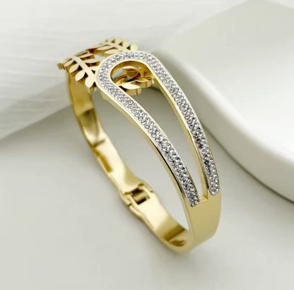 Dual Design Gold-Tone Bangle Bracelet  With A Delicate Leaf Motif and White Stones