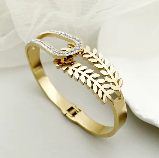 Dual Design Gold-Tone Bangle Bracelet  With A Delicate Leaf Motif and White Stones
