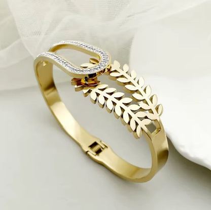 Dual Design Gold-Tone Bangle Bracelet  With A Delicate Leaf Motif and White Stones