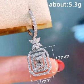 Silver Plated American Diamond Studded Iconic Luxury Geometric Drop Earrings