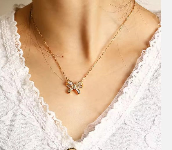 Gold Plated Stainless Steel Bow Pendant with CZ stones Necklace