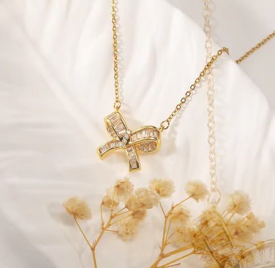 Gold Plated Stainless Steel Bow Pendant with CZ stones Necklace