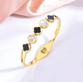 The Contrasting Black & White Clover Bangle