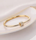 Gold Plated  Stainless Steel American Diamond Studded Bangle Style Bracelet