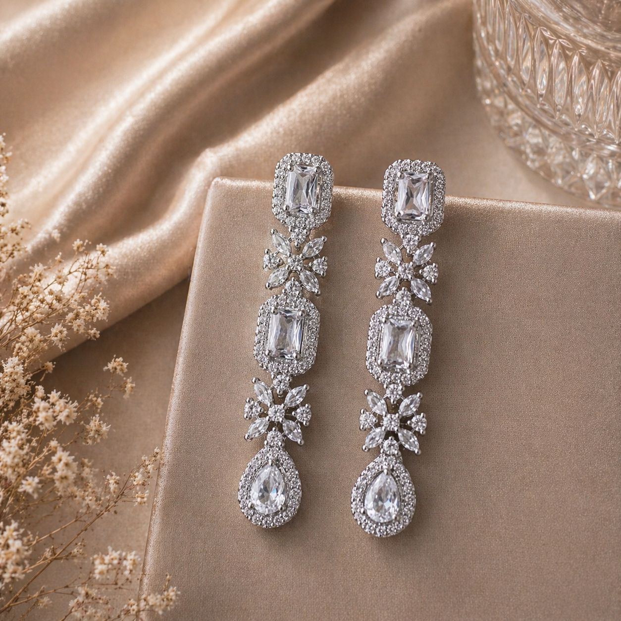 Classic White Cubic Zirconia Drop Earrings with Floral Detailing