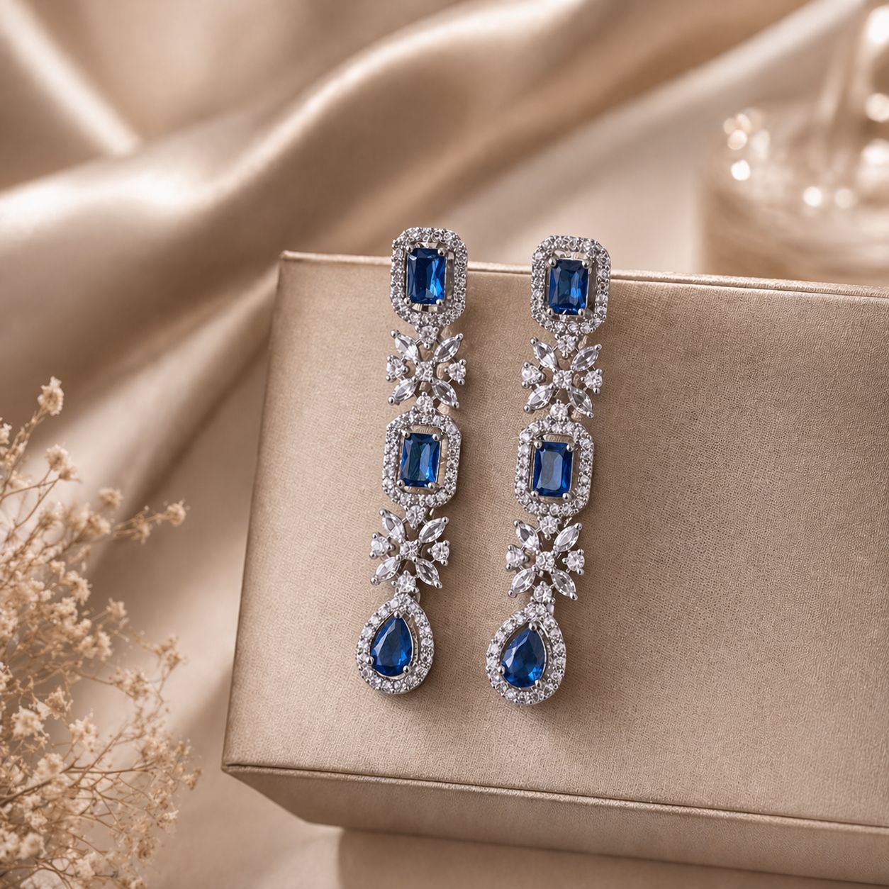 Royal Blue Cubic Zirconia Drop Earrings with Floral Detailing