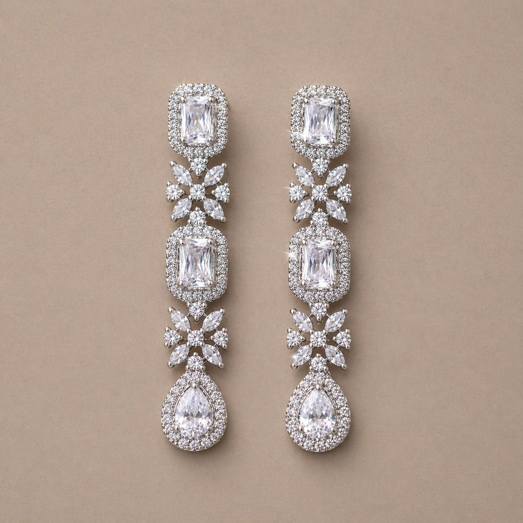 Classic White Cubic Zirconia Drop Earrings with Floral Detailing