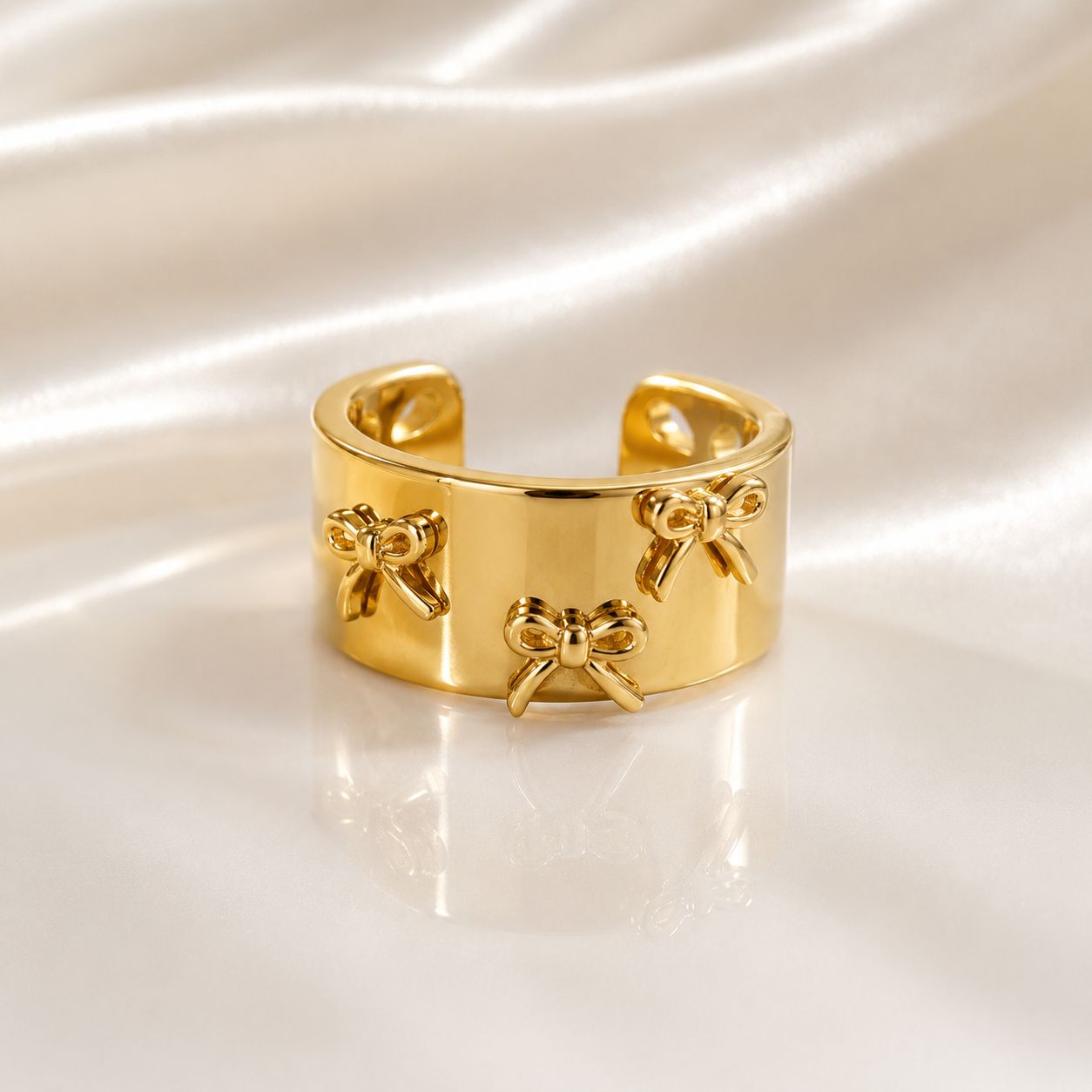 Gold Plated Adjustable Ring with Raised Bow Accents
