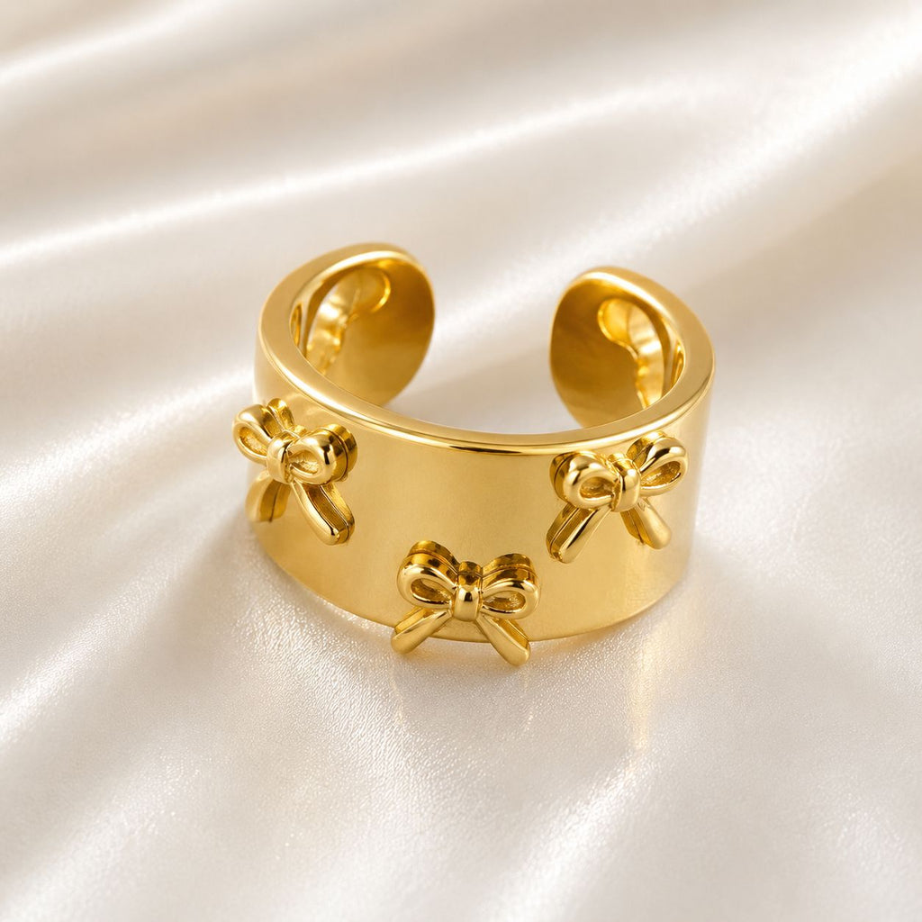 Gold Plated Adjustable Ring with Raised Bow Accents